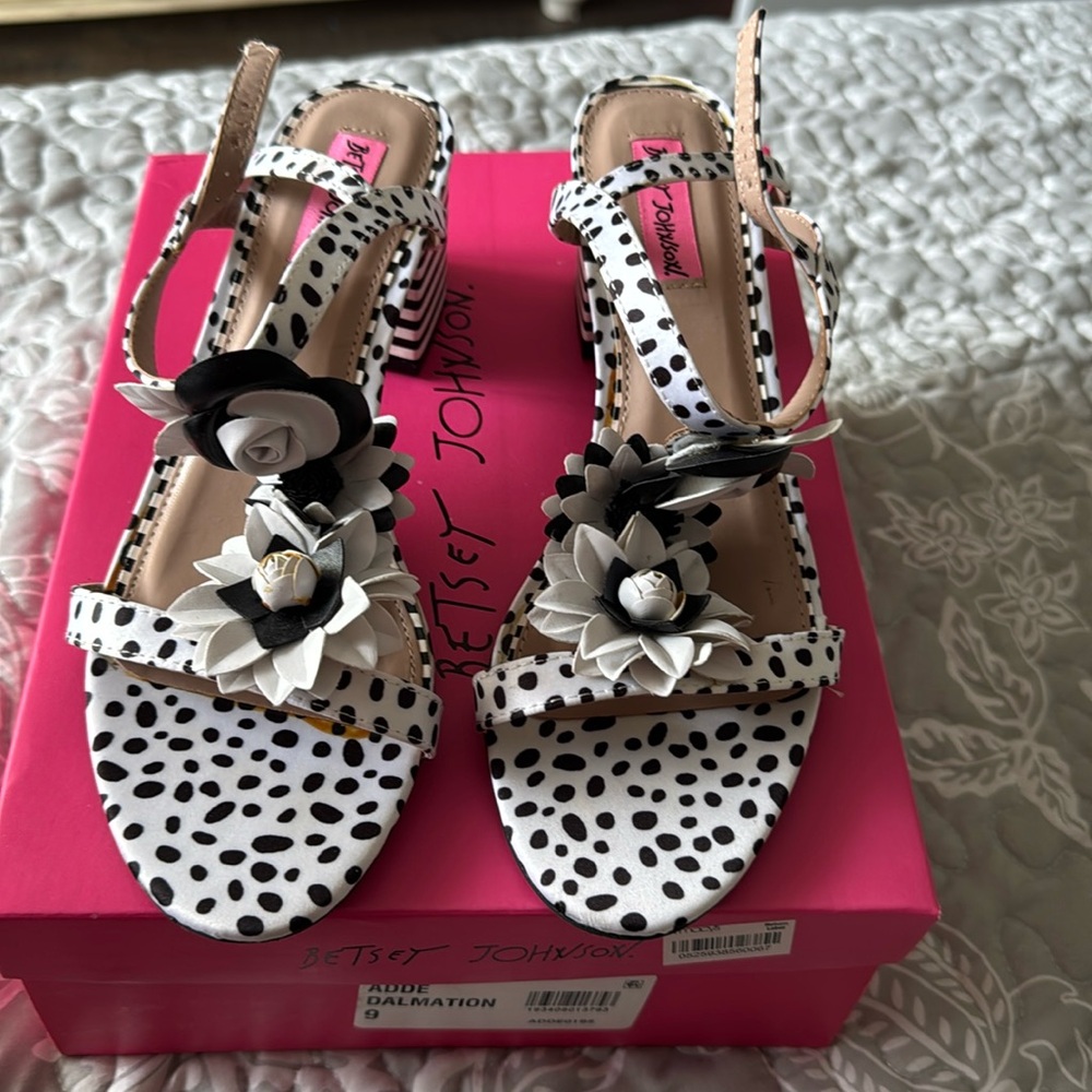 Gently used Betsy Johnson Adde Dalmation sandals with box included.